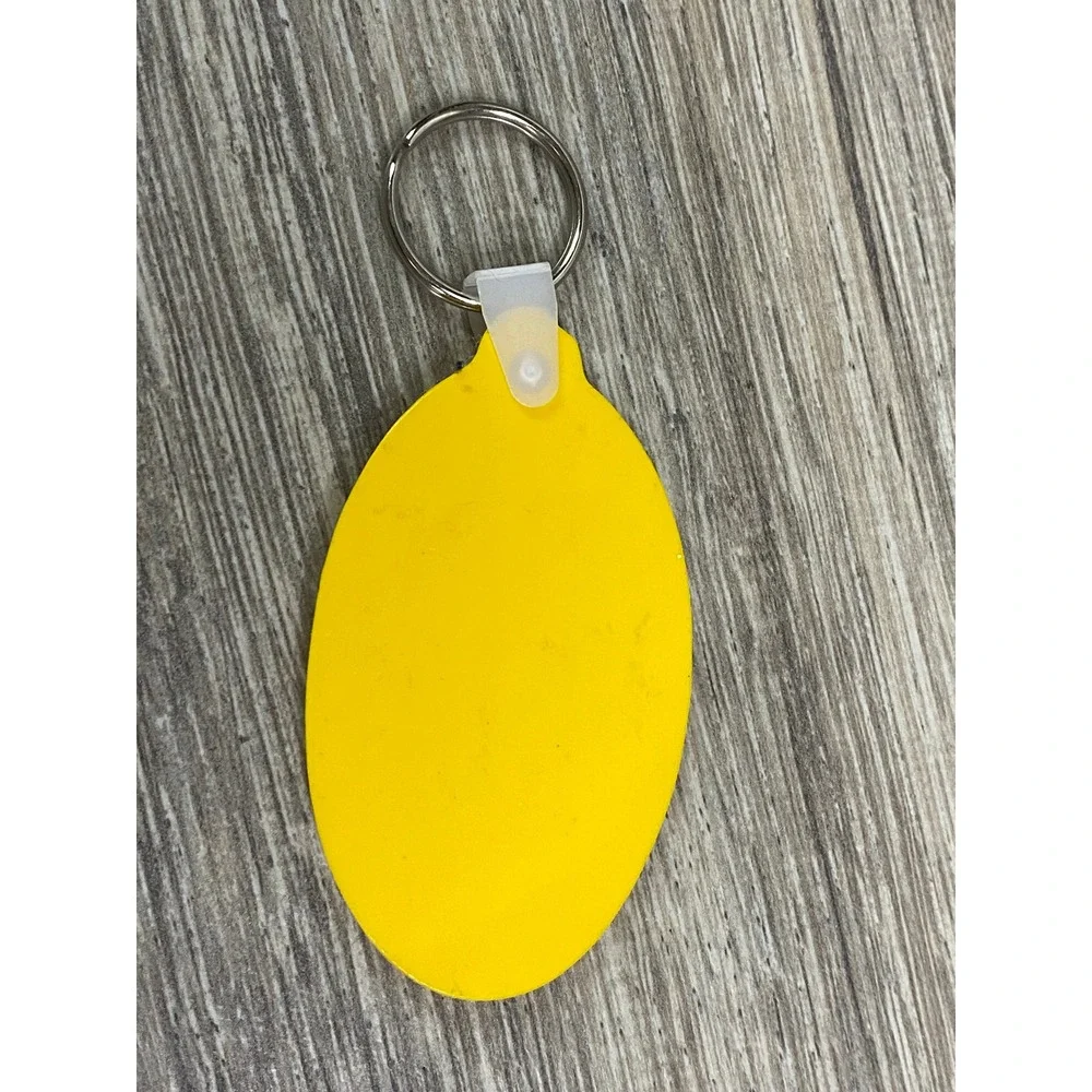 Vintage Malibu Rum‎ Yellow Rubber Keychain Mardi Gras Carnival Logo USA Made